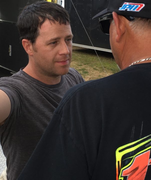 Travis Benjamin takes a break during Friday's Oxford 250 practice session at Oxford Plains Speedway. Benjamin, an two-time Oxford 250 winner, knows that the race relies on smaller teams to be successful.