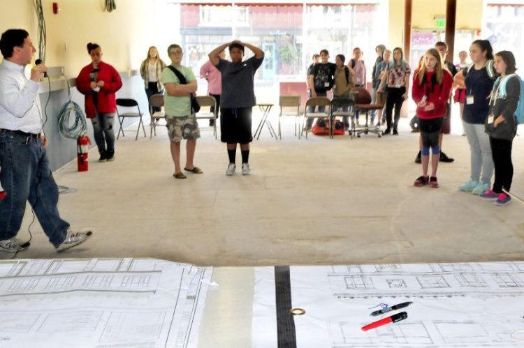 Engineer and building designer Steve Govoni, left, of Wentworth Partners Associates speaks with Cornville Regional School students inside the downtown Skowhegan school site on Monday. Students will learn about the design process and provide input to Govoni and the contractors working on the project in the next couple of weeks.