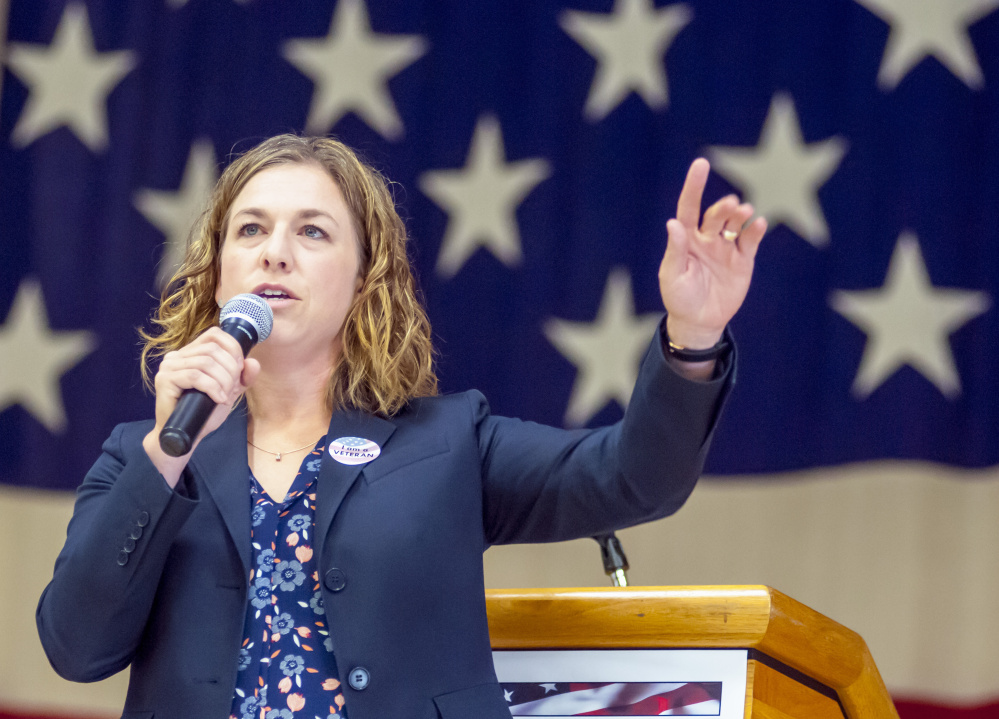 Adria Horn, Maine Veterans Services director, talks to employers before the Hire-A-Vet job fair at the Augusta Armory in August, 2017.