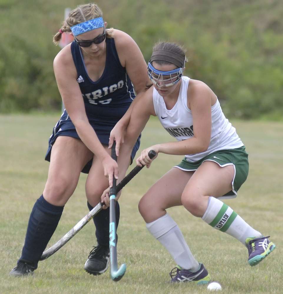 Winthrop's Moriah Hajduk, right, collides with Dirigo's Alexa Farnum during a field hockey game Wednesday in Winthrop. The Ramblers won, 2-1.