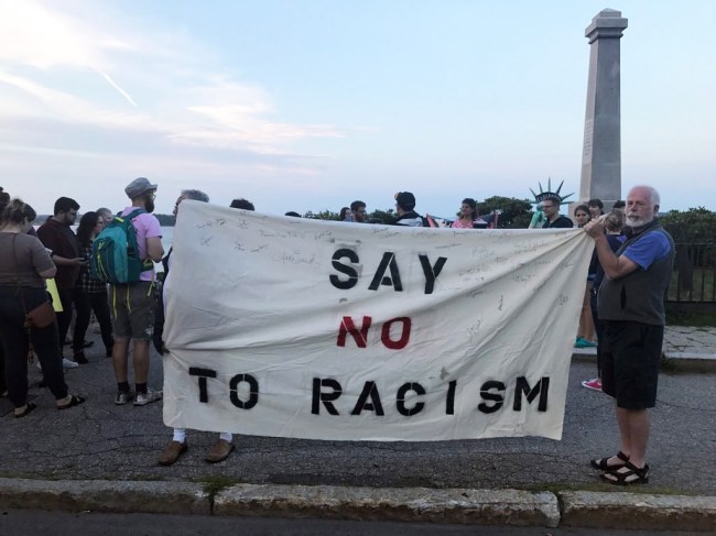 People turn out at Portland's Eastern Promenade on Saturday evening to stand in solidarity with the victims of the violence in Charlottesville, Va. Earlier Saturday, a car plowed into a crowd after white supremacists and counterprotesters clashed. 