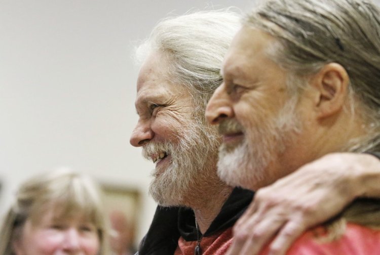 Jack Fogg poses for a photo with Mike Barden during a living wake for Jack, who is dying of liver cancer. (Staff photo by Jill Brady)