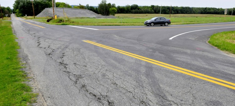 A car turns onto Trafton Road in Waterville on Wednesday from the new northbound exit off Interstate 95.