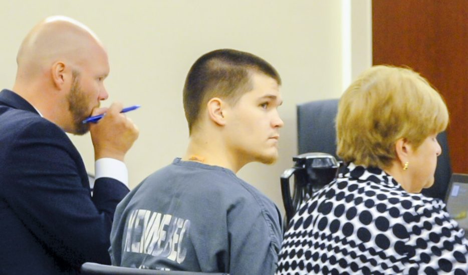 Derrick Dupont, center, sits with attorneys Scott Hess, left, and Pamela Ames during a bail hearing Tuesday at the Capital Judicial Center in Augusta.