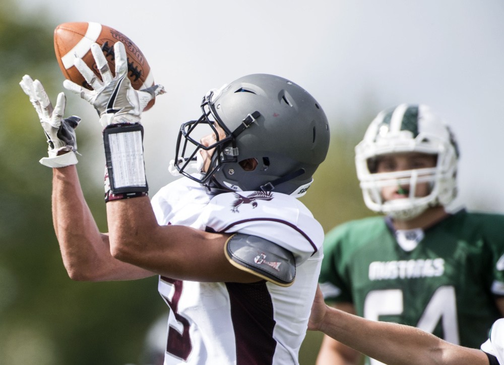 Ellsworth's Javon Williams (3) makes a catch against Mount View High School in Thorndike on Saturday.
