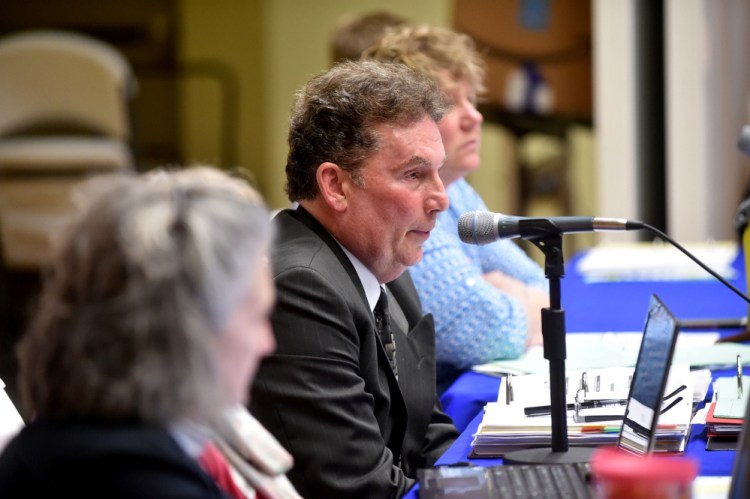 Dr. Tom Ward, superintendent of Regional School Unit 9, answers questions regarding the school budget during a budget meeting April 27 at Mt. Blue High School in Farmington.