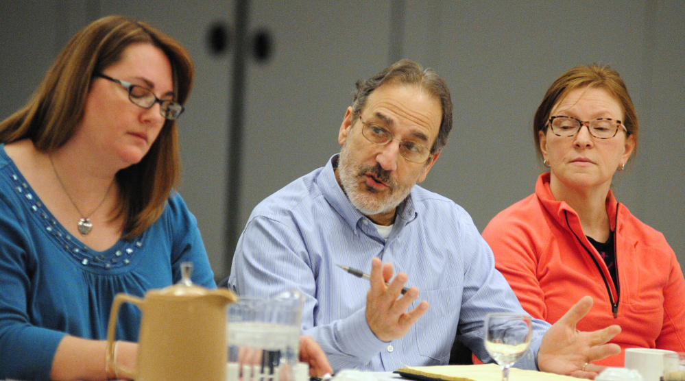 Augusta Board of Education Chairwoman Kim Martin, left, listens as School Superintendent James Anastasio speaks on Jan. 28 during the annual City Council goal-setting meeting at the Augusta Civic Center. At-large Councilor Marci Alexander is at far right. The Board of Education on Wednesday approved a new contract for Anastasio.