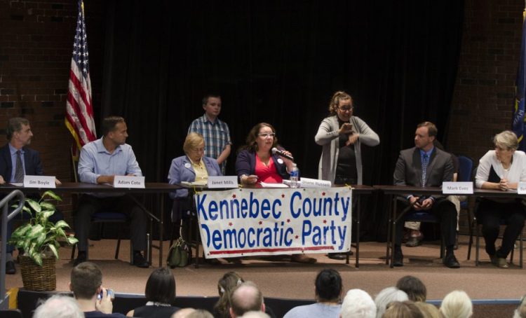 Democratic candidates for governor participate in a forum in September at the University of Maine of Augusta. From left are candidates Jim Boyle, Adam Cote, Janet Mills and Diane Russell; sign language interpreter Paula Matlins; and candidates Mark Eves and Betsy Sweet.