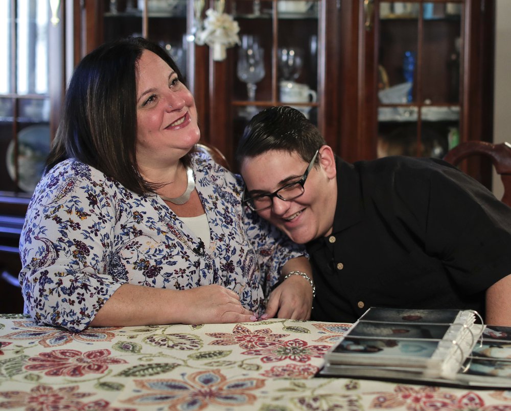Beth Guardino and her son, Christian, 17, talk about his life before and after gene therapy treatment for his hereditary blindness during an Oct. 2 interview in Patchogue, N.Y.