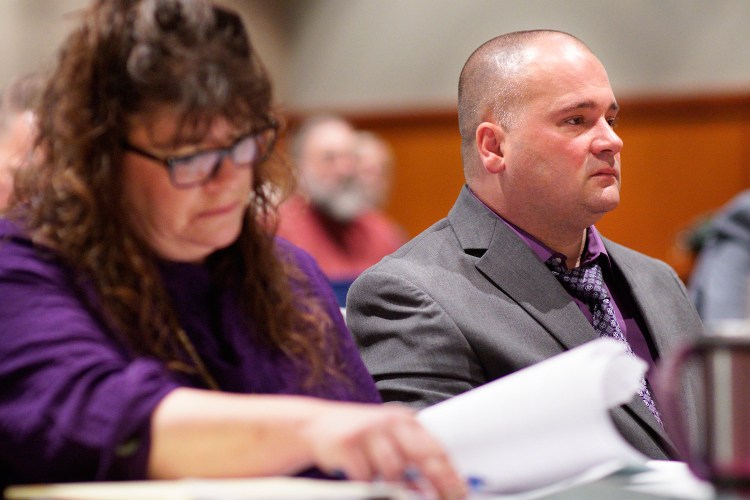 Anthony Sanborn sits in court while his attorney Amy Fairfield looks over paperwork at the Cumberland County Courthouse on the first day of Sanborn's post-conviction review on Tuesday. Sanborn was convicted for the 1989 murder of Jessica Briggs and served 27 years in prison before being released on bail because a key witness for the prosecution recanted her testimony.