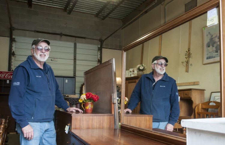 Gary Leighton, who raised concerns about the Augusta ordinance adopted Thursday when it was introduced in a different form, stands in his shop, Uncle Gary's Stuff, on June 6 at 2 Orchard St. in Augusta.