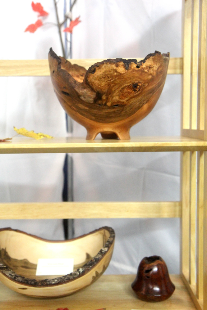 Some wooden bowls on display made by Dennis Curtis at an "Art on the Courts" fundraiser in Augusta on Sunday to benefit Maine General's OutPatient Plus Program and the Kennebec Valley Tennis Association.