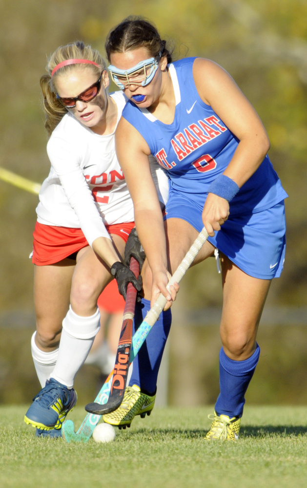 Cony's Sophie Whitney, left, and Mt. Ararat's Kayleigh Temple fight for a ball during a Class A North quarterfinal game Tuesday in Augusta.