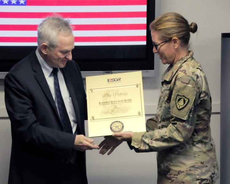 Thomas McAdam, Kennebec Behavioral Health's chief executive officer, and Col. Diane Dunn, Maine National Guard chief of staff.