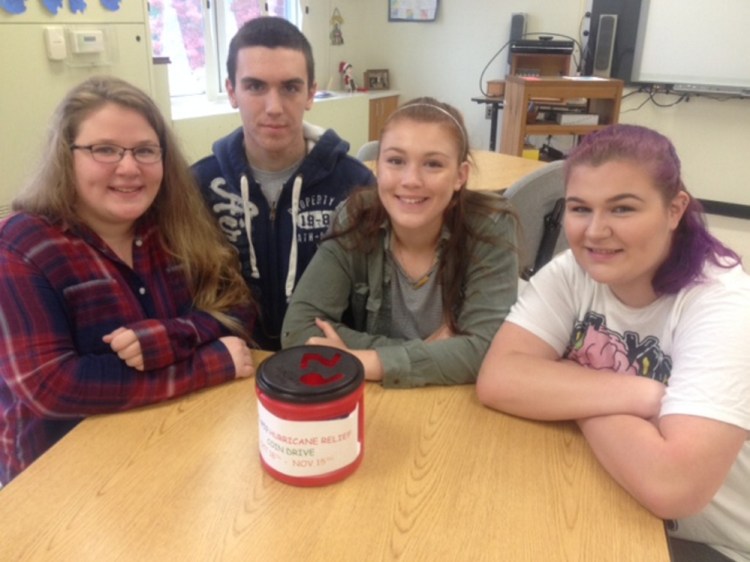 Madison Area Memorial High School Community Service class members, from left, Madeleine Theriault, Tyler Briggs, Lauren Hay and Sabrina Furbush.