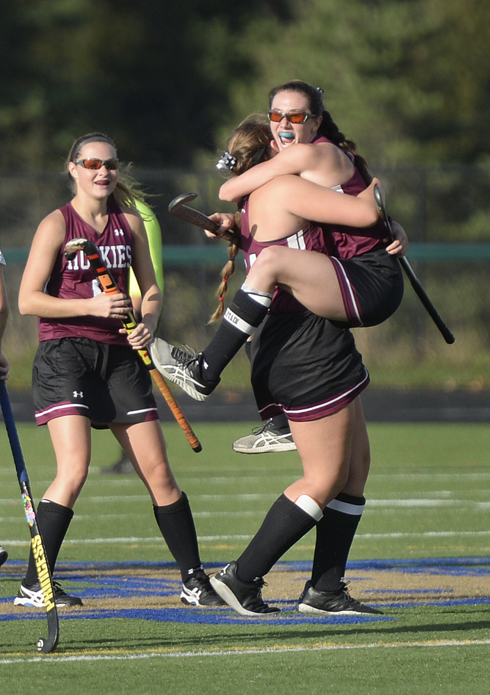Maine Sunday Telegram photo by Shawn Patrick Ouellette 
 Addi Williams jumps into the arms of Maine Central Institute teammate Eva Bickford after Williams scored a second half goal in the Class B state championship game Saturday against York at Falmouth High School.
