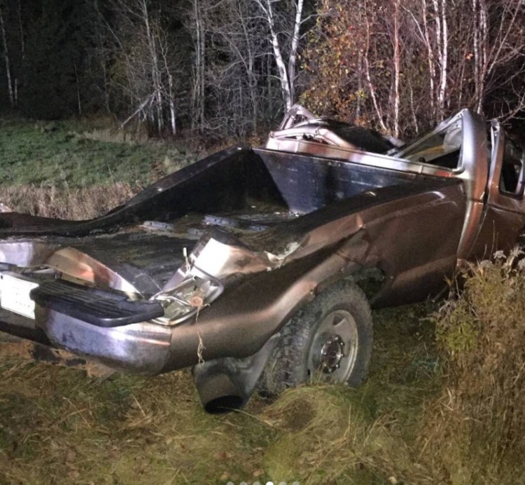 The scene of the truck crash in Woodland Monday night. The driver was taken to a hospital with injuries that were believed to be non-life-threatening.