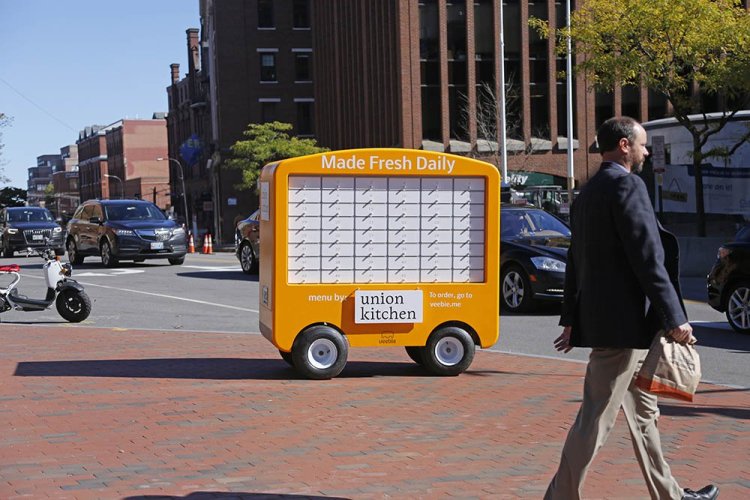 This Veebie fresh food kiosk was parked at the corner of Middle  and Temple streets during lunchtime Tuesday. The kiosk, with a daily changing menu, was serving food from Union Kitchen. Four other vendors will stock the kiosk on other weekdays: Daily Greens on Mondays; Sisters Gourmet Deli, Wednesdays; b.Good, Thursdays; and Foodworks, Fridays.