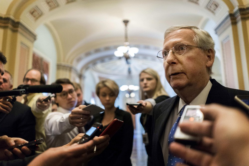 Senate Majority Leader Mitch McConnell talks to journalists about Alabama Senate candidate Roy Moore on Nov. 9 in Washington.