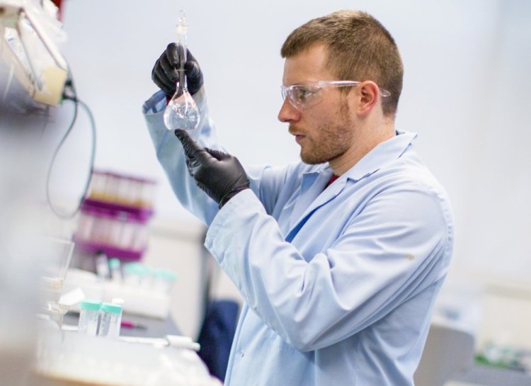 Craig Burnell of Bigelow Labs tests seawater for the presence of amnesic shellfish toxin, caused by a marine bioxtoxin known as domoic acid. If shellfish exceed domoic acid levels of 20 parts per million, a number set by the federal government, state officials must close harvesting. 
