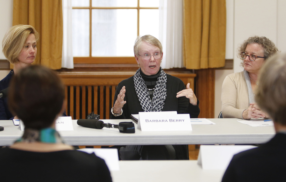 PORTLAND, ME - NOVEMBER 13: Portland High school teacher Sally Reagan, left, and Nancy Smith, of GrowSmart Maine, right, listen as Barbara Berry, center, a representative from the Maine Association of Realtors, discusses the mortgage deduction during a round-table discussion at City Hall with Congresswoman Chellie Pingree regarding the Republican tax plan, HR 1. (Staff photo by Jill Brady/Staff Photographer)