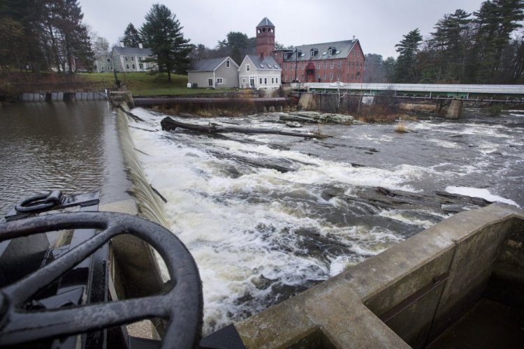 The Bridge Street Dam creates the impoundment and flatwater popular with paddlers and skaters.