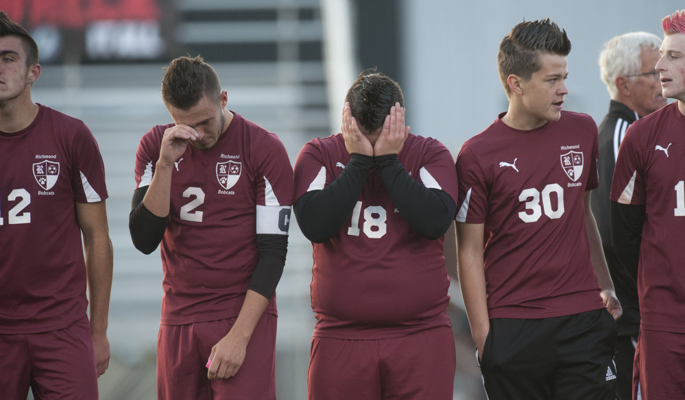 Richmond's Zach Small, Matt Rines, Dustin Simmons, John Paradis and Adam Beaulieu react after losing to Bangor Christian in the Class D state championship game Saturday at Hampden Academy.