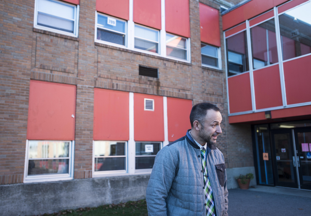 Jason Briggs, principal of Winslow Junior High School stands outside of the school at the end of the school day Nov. 8 in Winslow.