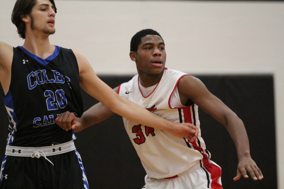 Thomas College forward Carlos Gonzalez plays in a game against Colby last season. Gomzalez, the lone returning senior for the Terriers, will anchor the team this season.