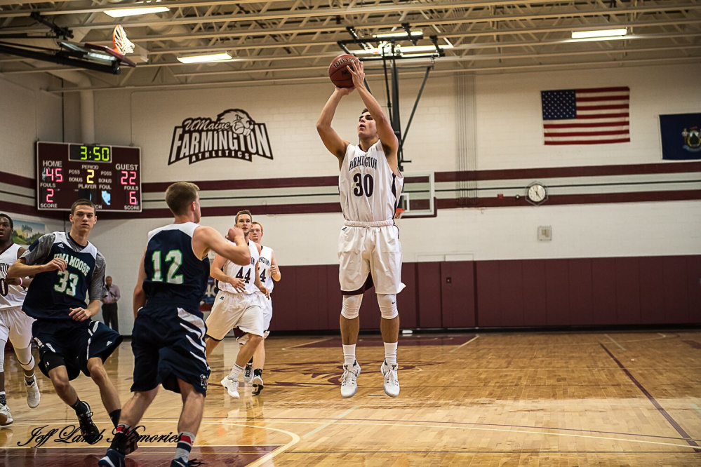 University of Maine at Farmington forward Riley Robinson takes a shot during a game last season.
