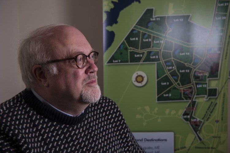 Jim Dinkle, executive director of FirstPark, poses for a portrait Tuesday in the conference room at the FirstPark offices in Oakland.
