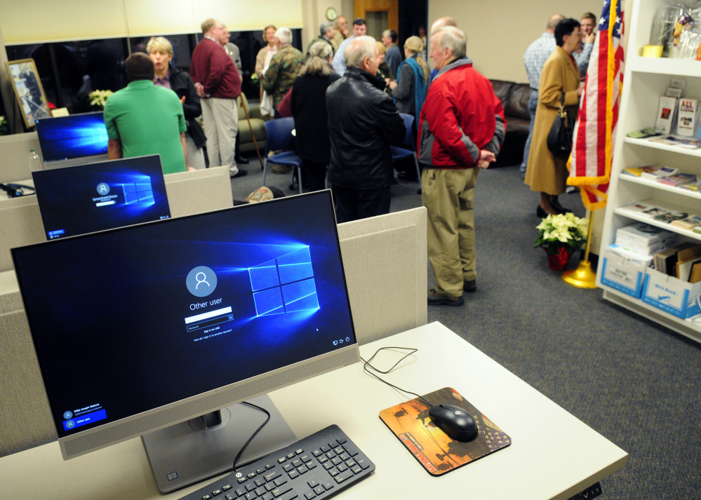 After the ribbon-cutting Thursday, people look around inside the new Veterans Academic Center at the University of Maine at Augusta.
