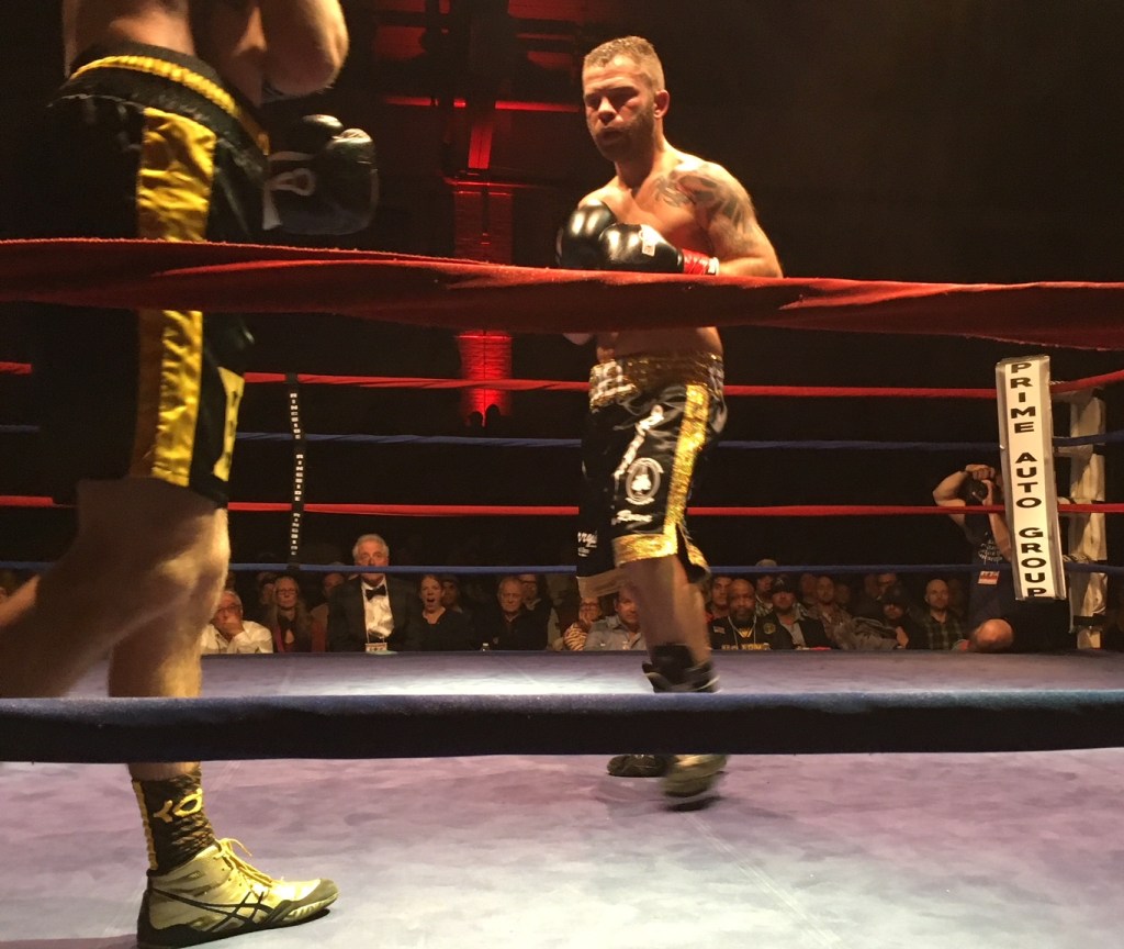 Brandon Berry of West Forks stands in the center of the ring during his fight Saturday night at the Portland Expo.
