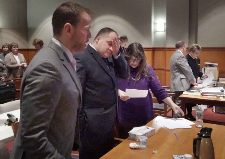 Standing between his attorneys Timothy Zerillo and Amy Fairfield, Anthony Sanborn is overcome with emotion while addressing Justice Joyce Wheeler at the Cumberland County Courthouse on Wednesday after being freed.