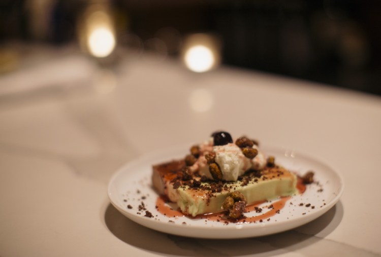 Spumoni with house-made chocolate, cherry and pistachio ice cream, amaro cherries, fresh whipped cream, candied pistachios and chocolate crumble.