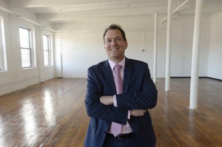 Westbrook's new economic development director, Daniel Stevenson, inside the Dana Warp Mill in Westbrook.