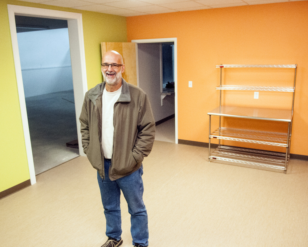 Executive director Alan Smith leads a tour Nov. 14 at the new site of Augusta Food Bank in Augusta. A delay in getting internet and phone service has delayed the opening of the location until Dec. 18.