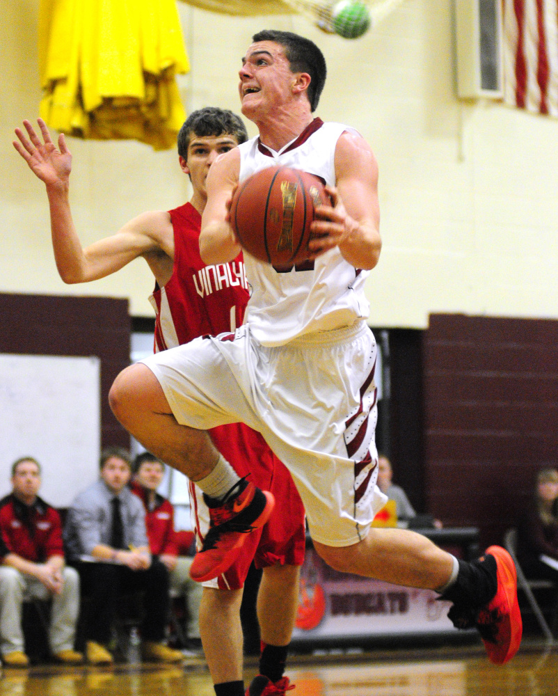 Richmond's Zach Small goes hard to the rim during a game last season against Vinalhaven. Small and the Bobcats have big expectations this season.