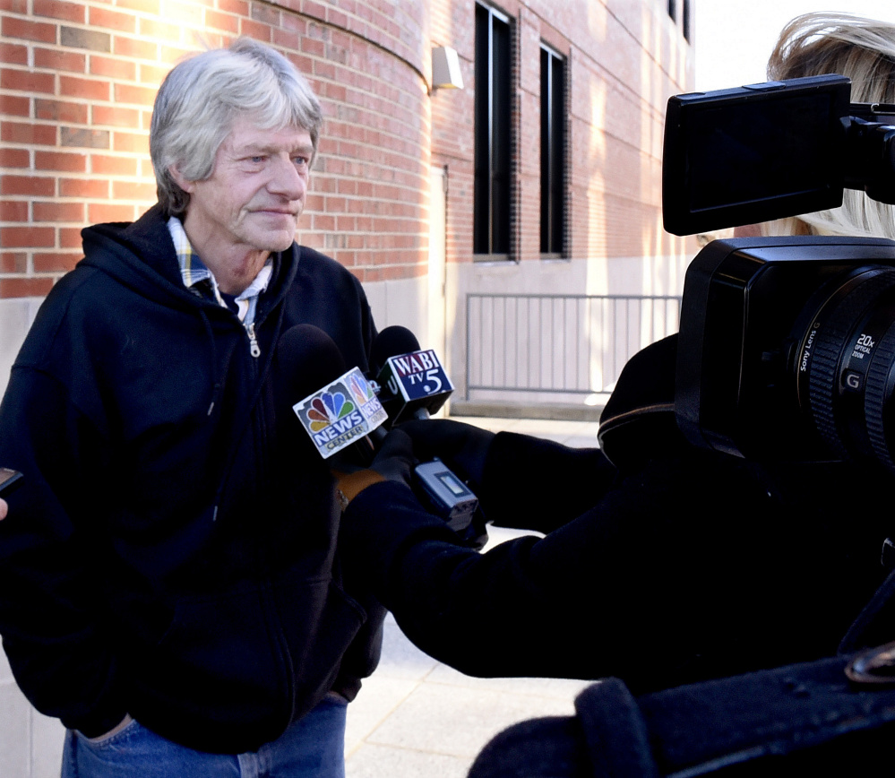 Vance Ginn speaks to the media outside Penobscot Judicial Center on Friday, where Robert Burton was sentenced to 55 years in prison for the murder of Ginn's daughter, Stephanie Gebo. Ginn spoke of the need to use ankle monitoring bracelets to prevent assaults and murders by people like Burton.