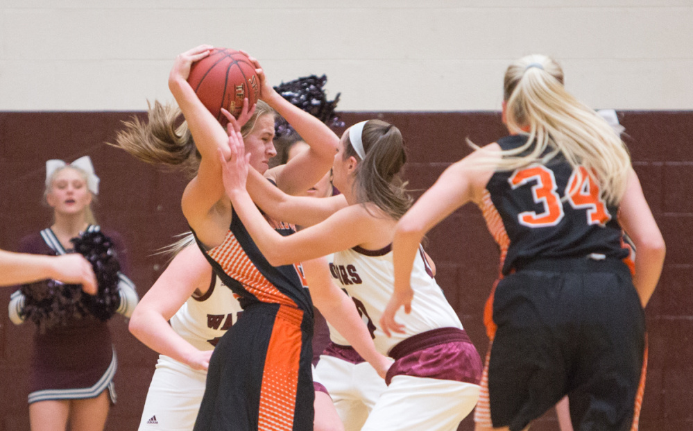 Skowhegan junior Sydney Reed tries to keep the ball away from Nokomis defender Maya Cooney during a Kennebec Valley Athletic Conference Class A game Monday night in Newport.