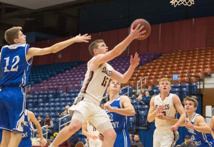 George Stevens Academy's Taylor Schildroth goes in for a layup against Erskine at the 2017 Maine Gold Rush Invitational Tournament on Tuesday at the Augusta Civic Center.