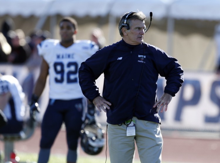 Maine head coach Jack Cosgrove watches from the sidelines during a Nov. 23, 2013, game against New Hampshire in Durham, N.H.