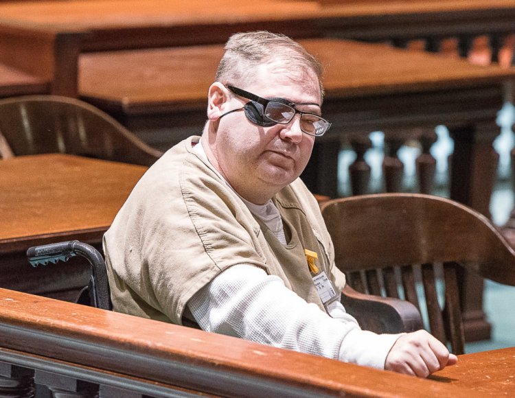 Michael Callahan, convicted of a shootout with the police, burning down his home in Minot, trying to burn down his wife's home, and ramming his wife's car and a police cruiser, appears in Androscoggin County Superior Court in Auburn for a post-conviction review. 