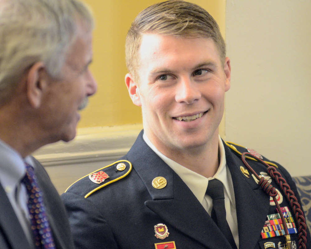 Sen. Roger Katz, R-Augusta, left, chats with Staff Sgt. Ryan McCarthy before the session on Wednesday at the State House in Augusta. McCarthy along with family and friends were there so that he could receive joint legislative sentiment congratulating him recently winning the <a href="http://preprod.pressherald.com/2017/1 7/mainer-wins-armys-top-nco-award/">Non Commissioned Officer of the Year award</a>. McCarthy grew up in Belgrade.