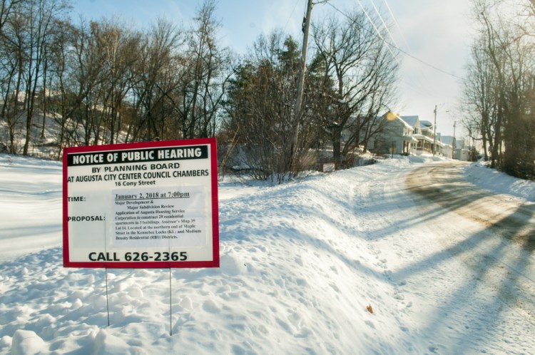 The proposed site for housing development at the end of Maple Street in Augusta is seen Tuesday near the former Statler Mill.