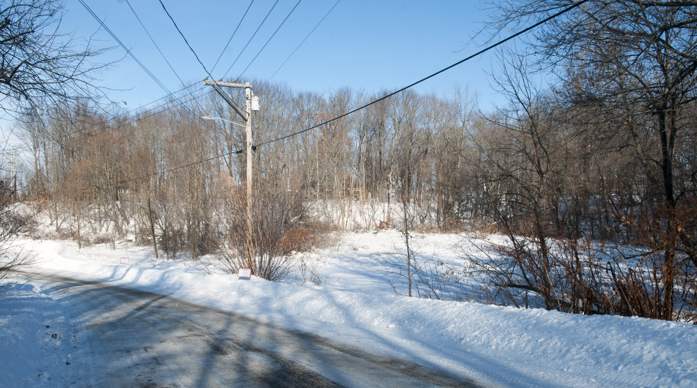 The proposed site for housing development at the end of Maple Street in Augusta is seen Tuesday near the former Statler Mill.