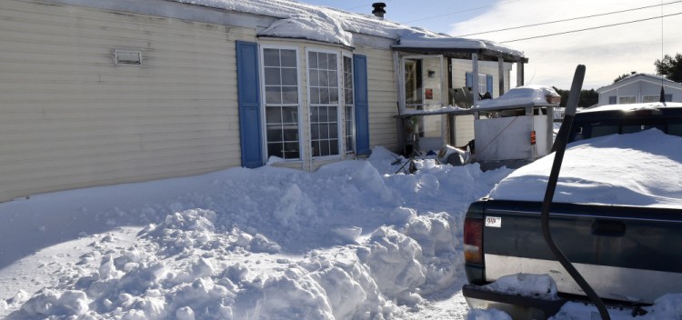 The mobile home at 54 Harvey's Mobile Home Park in Skowhegan on Sunday, where Skowhegan fire personnel discovered the deceased remains of owner William Lashon on Saturday. Lashon may have succumbed to an electrical fire inside a theater room full of projection equipment, according to fire officials.