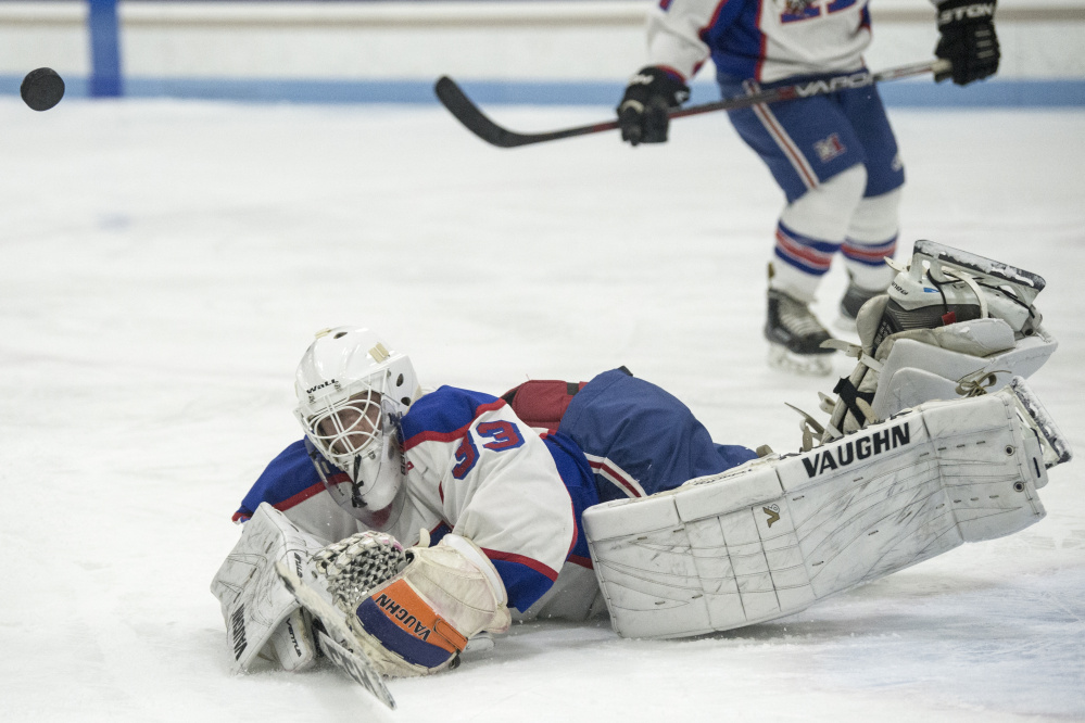 Messalonskee goalie Eli Michaud makes a save during a game agaimst Lawrence/Skowhegan/MCI last Wednesday night at Colby College.