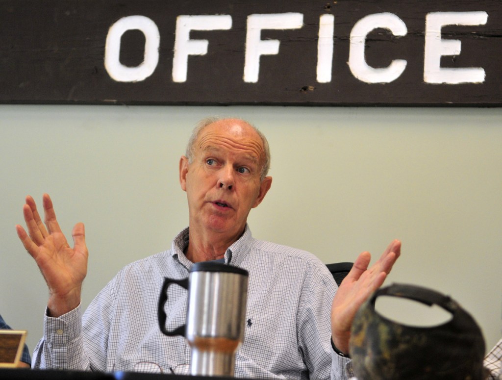 Selectman Ernie Rice answers questions about cost overruns on the new Town Office project during a special town meeting on Aug. 20, 2016, in the Belgrade Town Office. Rice is resigning from the select board after an earlier abortive attempt to depart.