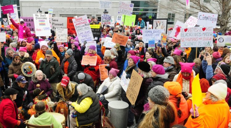 The Women of the Earth Drummers play the Red Hawk Medicine Drum to warm up the crowd on Jan. 21, 2017, before start of the Women's March on Maine at the Maine State House in Augusta. Another rally is planned for Saturday, one year after the original protest gathering.